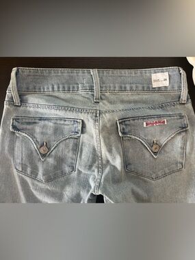 Hudson Jeans “Collin” Light Wash Blue Back Pocket Denim.